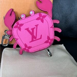 Louis Vuitton Fuchsia Crab Charm new in box never used